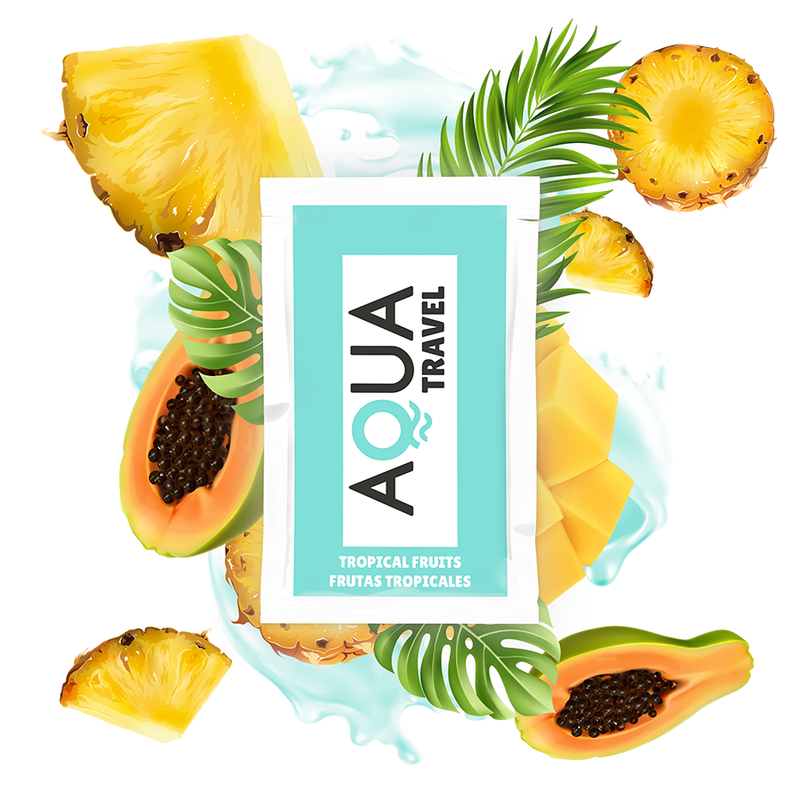 AQUA TRAVEL Tropical Fruits Packet surrounded by fresh pineapple, papaya, mango, and tropical leaves on a white background.