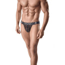 Model wearing Anais men jockstrap in black mesh, highlighting underwear design and fit.