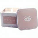 EOL After Dark pheromone massage candle in a soft pink container with lid, ideal for enhancing relaxation and ambiance.
