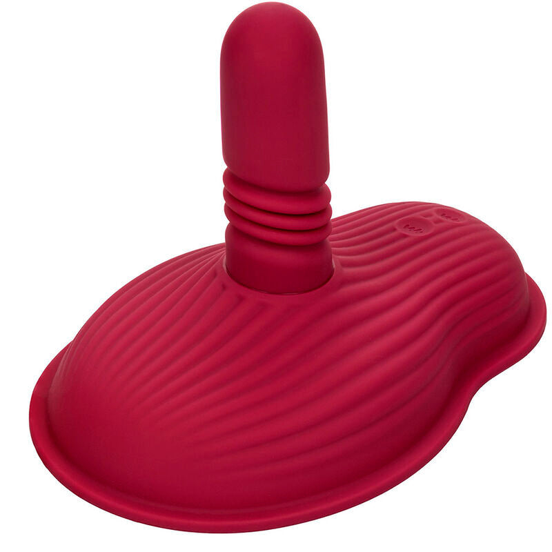 Red textured silicone massager with ergonomic design for muscle relaxation and tension relief.