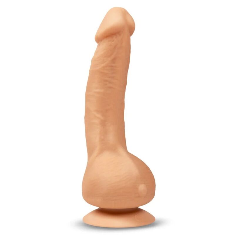 Realistic skin-tone vibrator with suction base, designed for lifelike feel and intense pleasure.