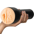 Realistic non-vibrating handheld stroker with signature, held in hand for intimate pleasure; skin-tone appearance, black casing.