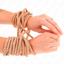 Hands tied with brown rope, showcasing intricate knot work and craftsmanship.