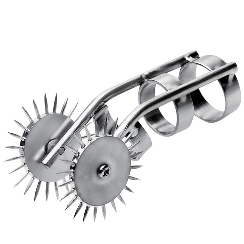 Dual spiked metal pinwheel for sensory play and BDSM doctor role-playing.