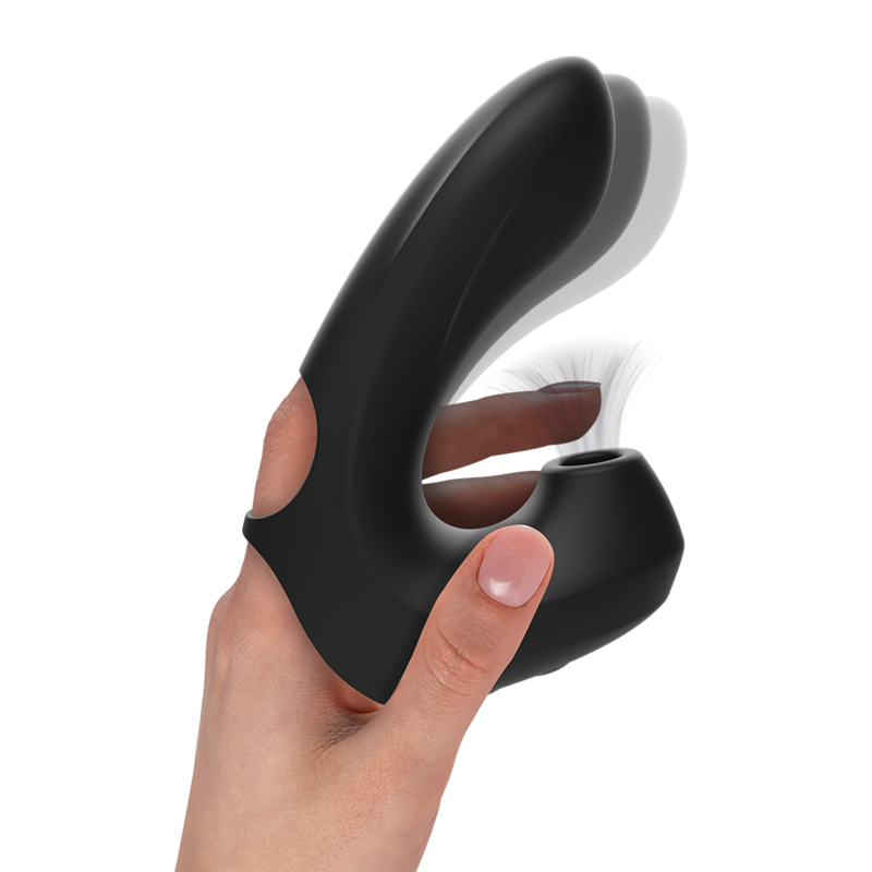 Person holding IBIZA Thimble Sucking Vibrator for clit stimulation and suction pleasure.