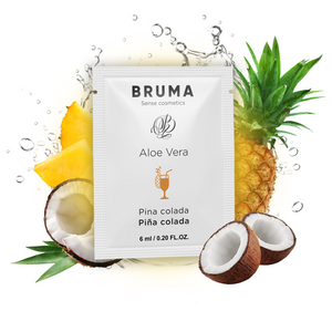 BRUMA Aloe Vera Sliding Gel in Piña Colada flavor, 6ml sachet, surrounded by pineapple and coconut.