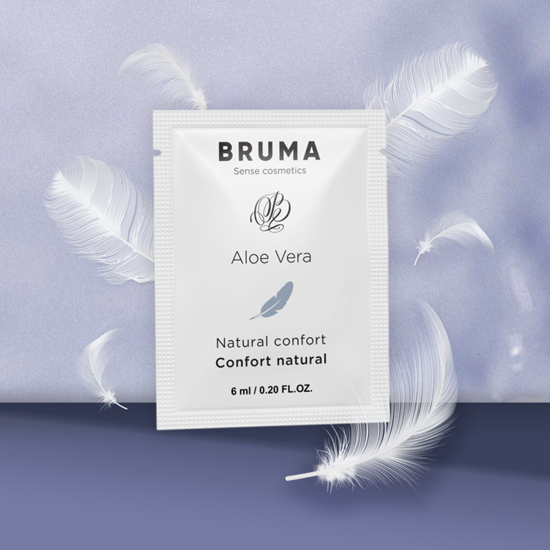 BRUMA Aloe Vera Sliding Gel 6ml pouch with natural comfort label, surrounded by feathers on soft background.