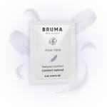 BRUMA Aloe Vera Sliding Gel 6ml sachet surrounded by soft white feathers, emphasizing natural comfort and sensual lubrication.