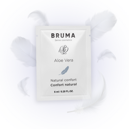 BRUMA Aloe Vera Sliding Gel 6ml sachet surrounded by soft white feathers, emphasizing natural comfort and sensual lubrication.