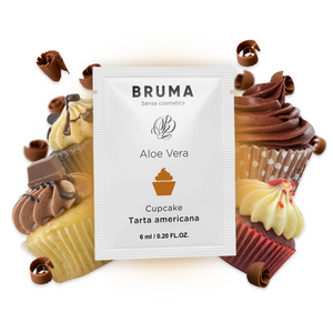 BRUMA Aloe Vera Sliding Gel Cupcake Flavor 6ml with cupcakes in background for intimate moments.