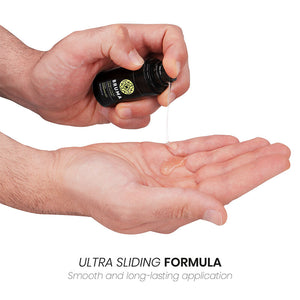 Hands applying BRUMA Liquid Vibrator Watermelon gel with ultra sliding formula for smooth, pleasurable sensations.