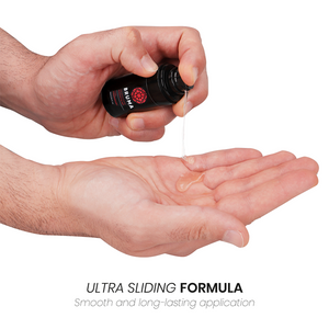 BRUMA Strawberry Flavor Stimulating Gel being poured into hands, showcasing smooth, ultra sliding formula for intimate use.