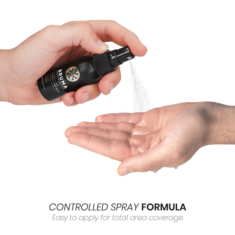 BRUMA Relaxing Anal Spray being applied to hand, showcasing its easy-to-use controlled spray formula for comfort.