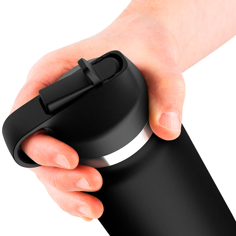 Hand gripping a discreet Fap Flask water bottle stimulator, ideal for travel and privacy.