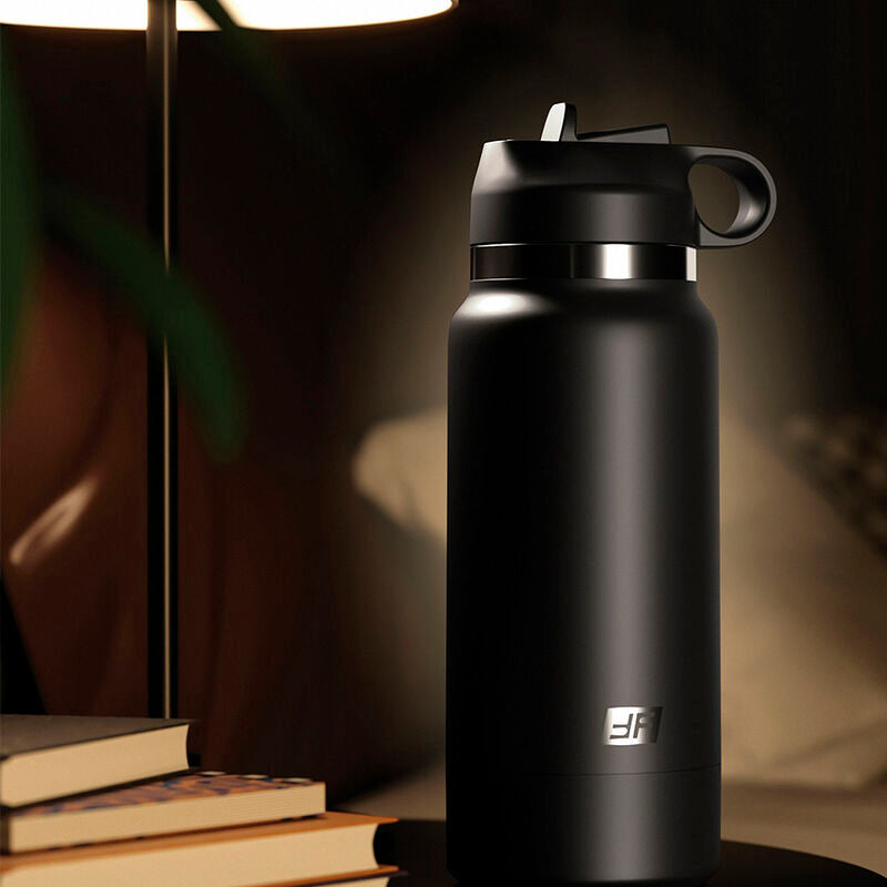 FAP Flask Bottle Discreet Stroker Model 1 blending in on a nightstand, resembling a modern reusable water bottle for privacy and discretion.