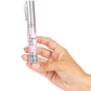 Hand holding SECRETPLAY Afrodita Perfume Pheromones for Women in travel size, perfect for enhancing attractiveness and gifting.