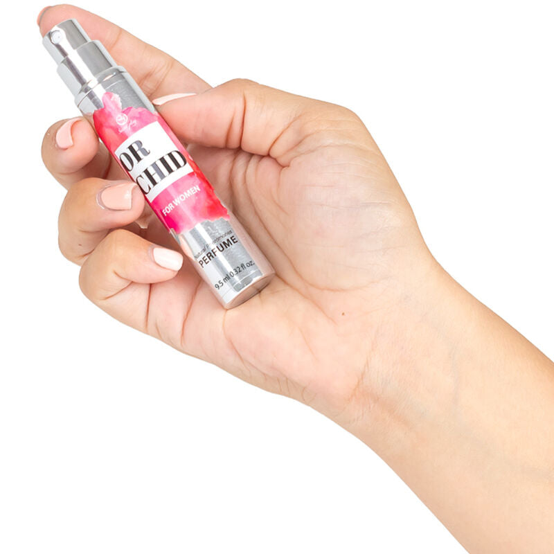 Travel-size Secretplay Orchid perfume pheromones spray for women, enhancing attractiveness with natural truffle extract scent.