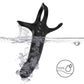Armony black dildo with ring and vibrator submerged in water, showcasing 100% waterproof design.