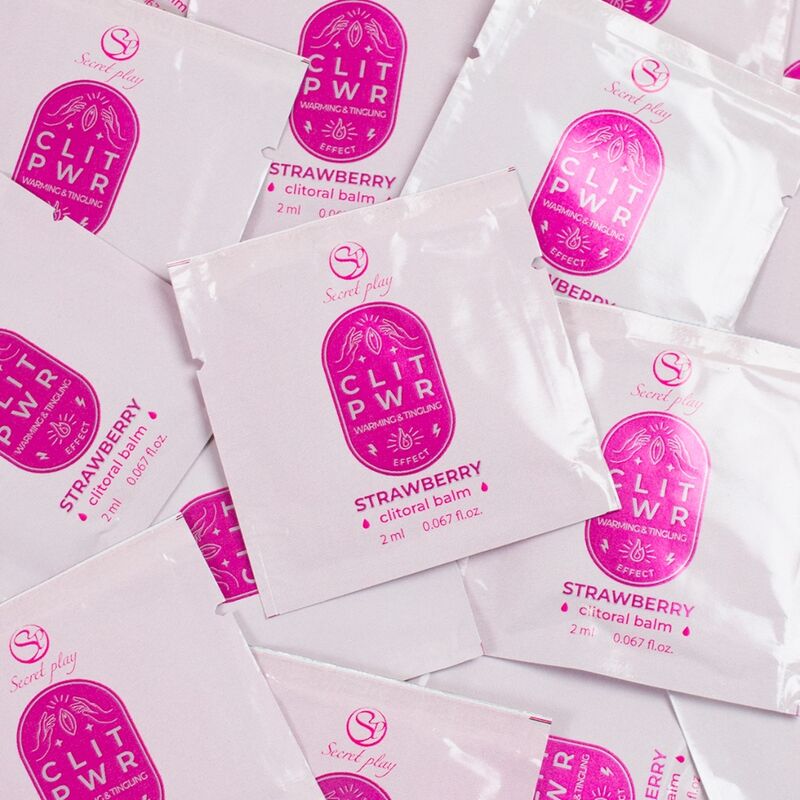 Single dose Secretplay strawberry lubricant packets for sensual massage and stimulation.